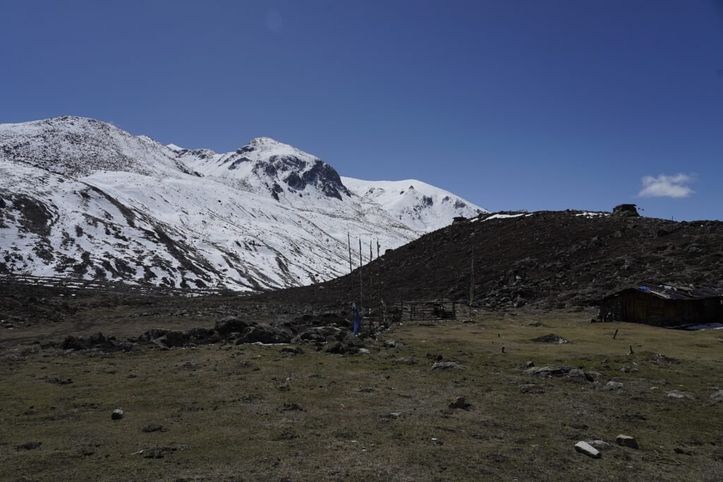 The Yumthang Valley in North Sikkim, a wide river flat under snow covered peaks