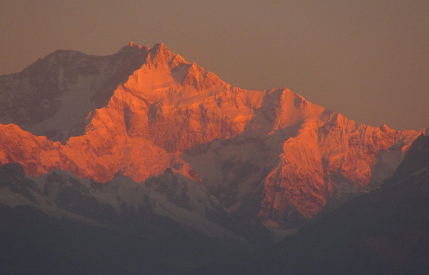 Kangchenjunga catching first light above the ridges seen from Darjeeling