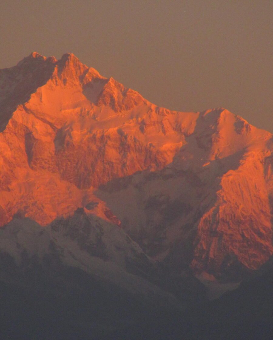 Kangchenjunga catching first light above the ridges seen from Darjeeling