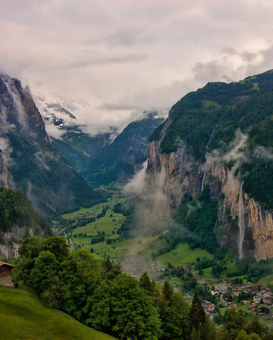 The Lauterbrunnen valley in Switzerland with waterfalls falling from its cliffs